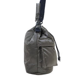Porter Yoshida Japan Tanker 2-Way Tool Bag in black, durable fabric with multiple compartments and carry handles, versatile for tools.