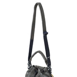 Black Porter Yoshida Japan Tanker 2-Way Tool Bag with multiple pockets and sturdy handles, designed for versatile tool storage.