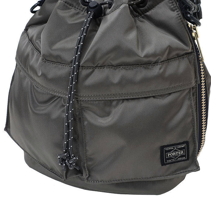 Porter Yoshida Japan Tanker 2-Way Tool Bag in black with multiple compartments and sturdy handles, designed for versatile tool storage.