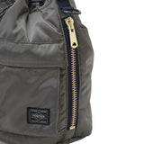 Black Porter Yoshida Japan Tanker 2-Way Tool Bag with multiple compartments, durable fabric, and sturdy handles for versatile use.