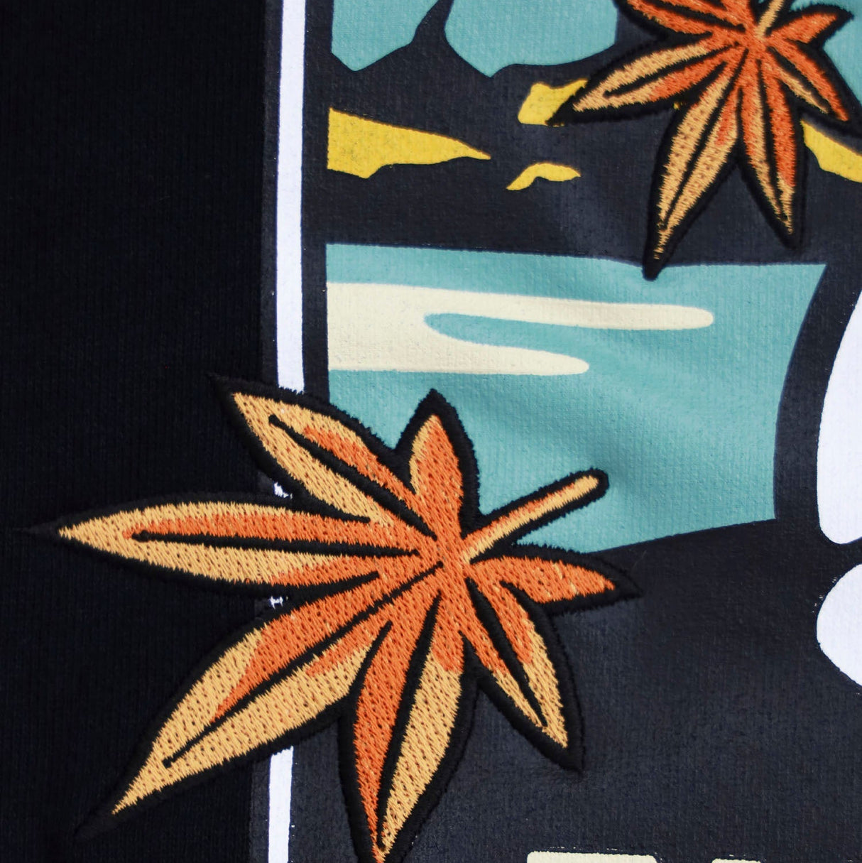 FR2 Autumn Leaves hoodie with fall-inspired leaf design, casual apparel made by #FR2, shown in a close-up image.