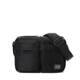 Black Porter Yoshida Japan Tanker Zip Sling Bag with adjustable strap and multiple compartments, stylish and compact for everyday use.