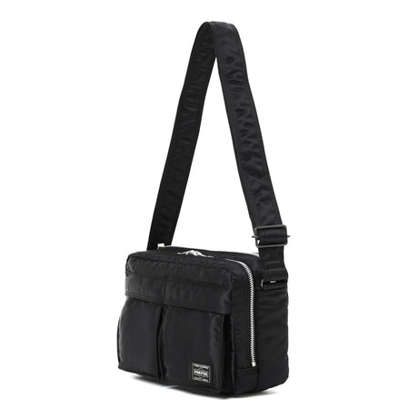 Black Porter Yoshida Japan Tanker Zip Sling Bag with adjustable strap and multiple compartments, stylish and functional for everyday use.