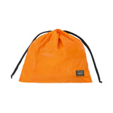 Black Porter Yoshida Japan Tanker Zip Sling Bag with adjustable strap and multiple compartments, stylish and durable for everyday use.