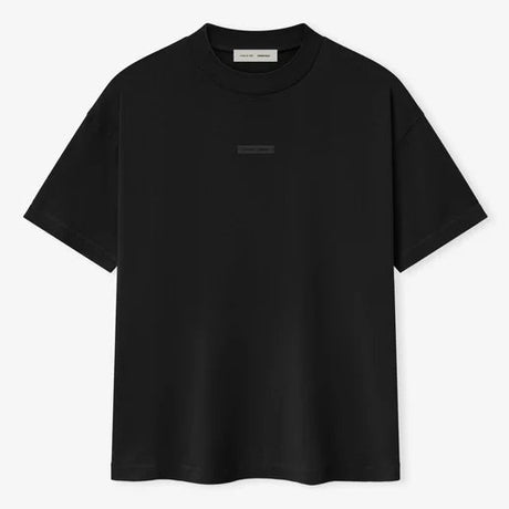 Fear of God Essentials metallic logo classic T-shirt in jet black, lightweight cotton, with a minimalist design and branded detail.