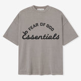 Fear of God Essentials Training 90s Heavyweight Tee in faded dune color, short sleeve cotton t-shirt with logo print.