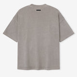 Fear of God Essentials Training 90s Heavyweight Tee in faded dune color, short sleeve casual apparel with a relaxed fit.