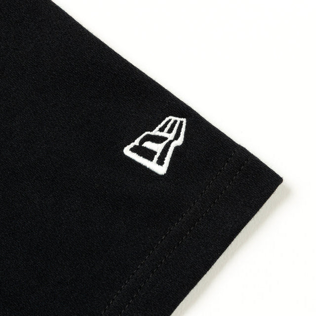 Mastermind Japan X New Era oversized black T-shirt, casual apparel with bold branding and relaxed fit, front view.