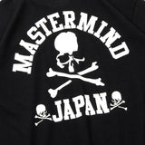 Black oversized T-shirt from Mastermind Japan X New Era apparel collection, featuring bold branding and relaxed fit.
