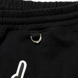 Black Mastermind Japan X New Era Script Logo shorts featuring the brand's logo on the front, casual apparel for streetwear style.