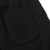 Black Mastermind Japan X New Era Script Logo shorts, casual apparel with branded logo detailing and comfortable fit.