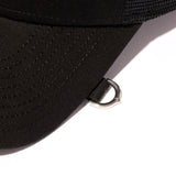 Black Mastermind Japan X New Era trucker cap with logo embroidery, adjustable snapback, and mesh back for ventilation.