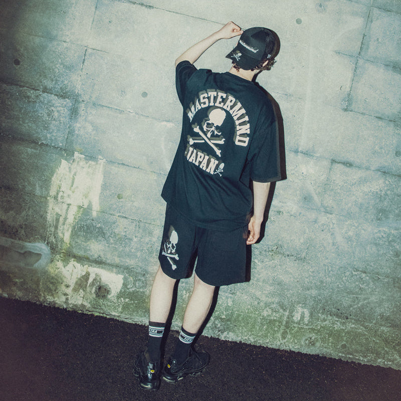 Mastermind Japan X New Era oversized black T-shirt, casual apparel with bold branding and relaxed fit, front view.