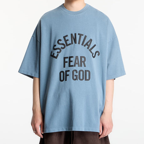 Fear of God Essentials Campus 90s Heavyweight Tee in faded coastal color, casual apparel with a relaxed fit and classic design.