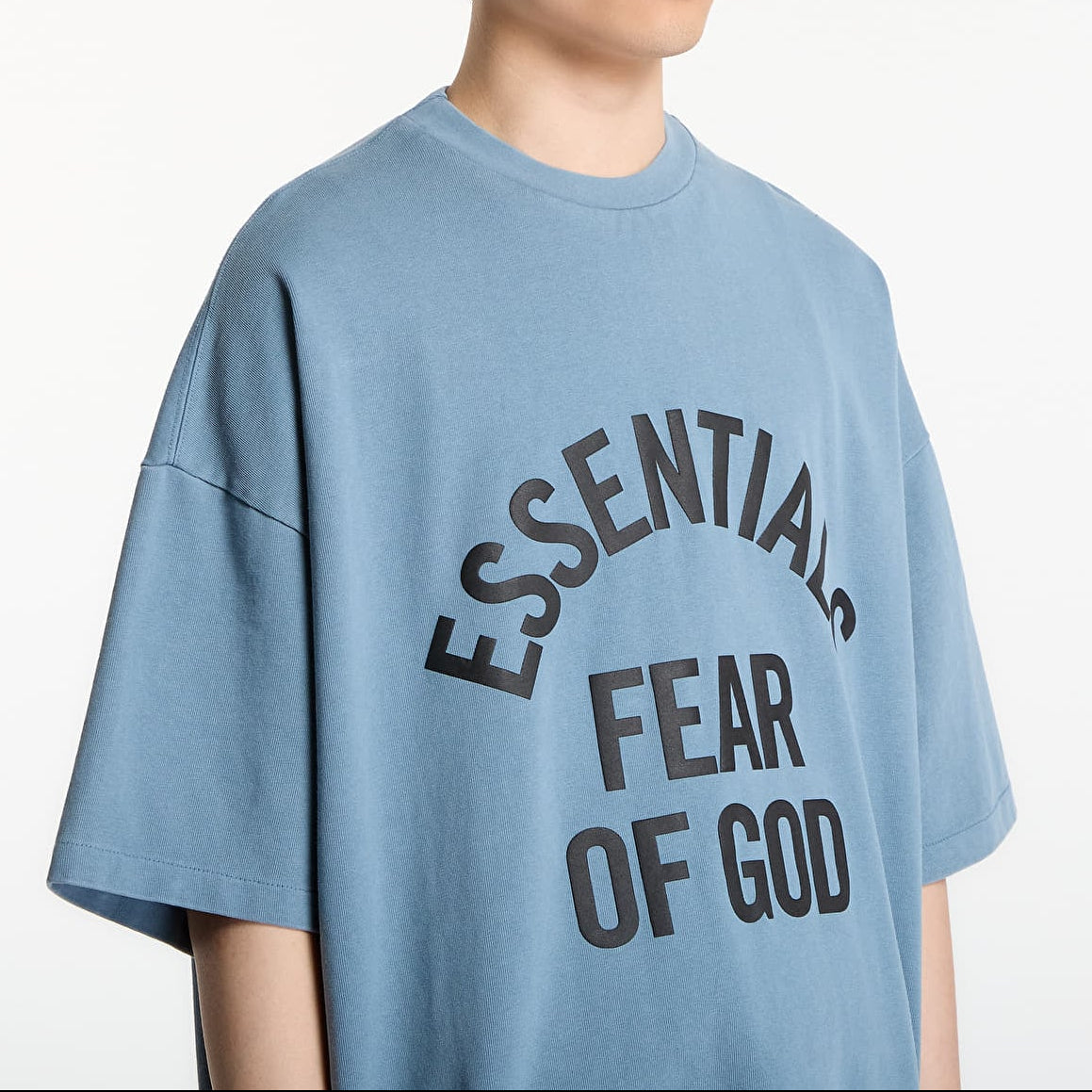 Fear of God Essentials Campus 90s heavyweight faded coastal t-shirt, casual apparel with a relaxed fit and faded coastal color.