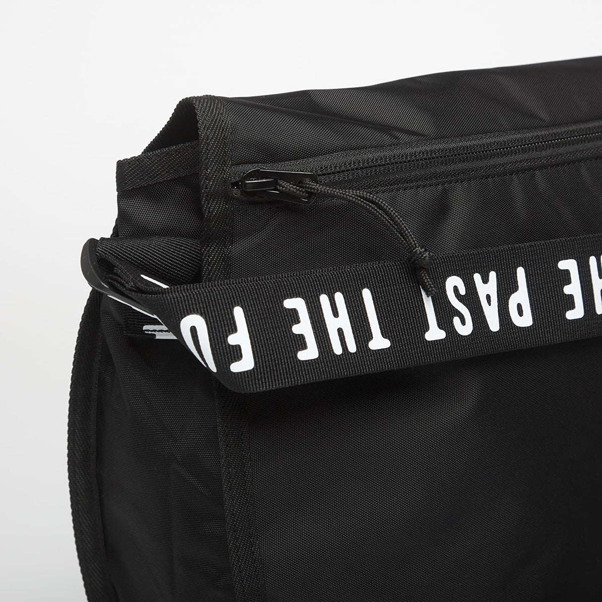 Black Human Made shoulder bag with adjustable strap and minimalist design, made from durable materials.