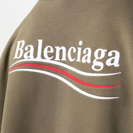 Balenciaga Political Campaign embroidery large fit hoodie in khaki, featuring bold political-themed design on front.