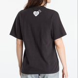 Human Made Tri-Color Heart Logo Tee in black, casual T-shirt with colorful heart graphic on the front.