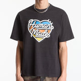 Black Human Made Tri-Color Heart Logo T-shirt featuring a colorful heart graphic on the front, casual and stylish apparel.