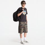 Black Human Made Tri-Color Heart Logo T-shirt with colorful heart graphic on the front, casual streetwear apparel.