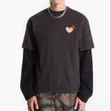 Black Human Made Japanese-Style Duck Tee featuring a graphic duck design, casual short-sleeve apparel for streetwear fashion.