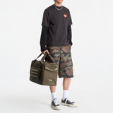 Human Made Japanese-style black duck graphic T-shirt, casual men's apparel featuring a printed duck design.