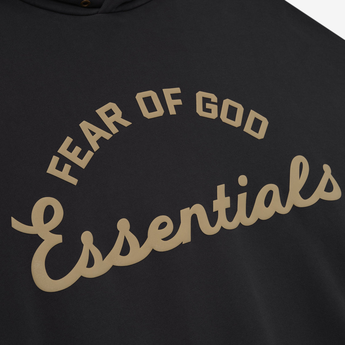 Fear of God Essentials Training 90s Heavyweight Hoodie in faded black, showing front view with hood and logo details.