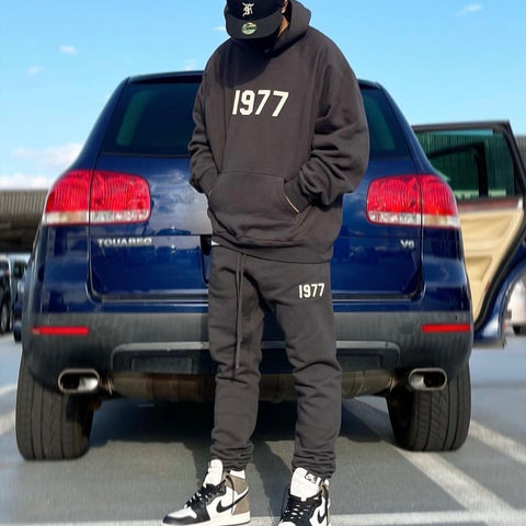 FEAR OF GOD Essentials 1977 Logo Hoodie Black