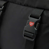 Black Human Made military backpack with multiple compartments and adjustable straps, designed for durability and style.