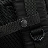 Black Human Made Military Backpack with multiple compartments and sturdy straps, designed for durability and style.