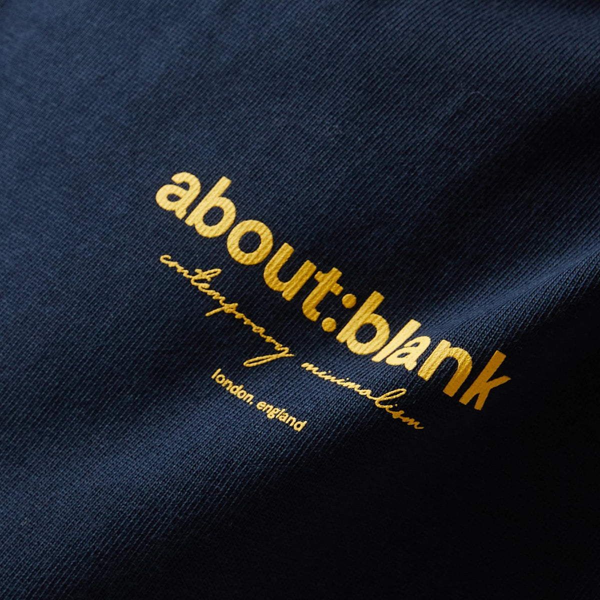 Navy AboutBlank Reverse Blank Tee shirt from APPARELS collection, featuring a casual fit and minimalist design.