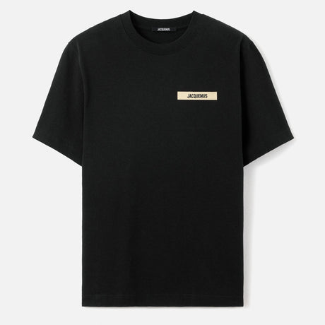 Black Jacquemus Grosgrain Logo Tee with visible logo detail, styled as a casual apparel piece from MASTERMIND JAPAN.