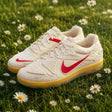 NIKE PEACEMINUSONE x Cryoshot CTR360 Maestri II shoes in natural university red, showing the athletic sneaker's design and vibrant color