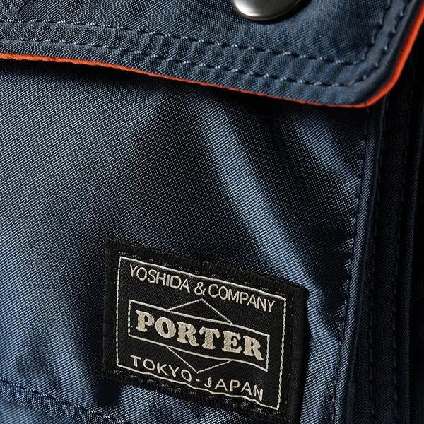 Porter Yoshida Japan Navy Tanker Envelope Bag featuring a sleek design and durable material, ideal for everyday use.