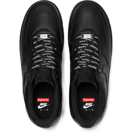 Supreme x Nike Air Force 1 Low sneakers in black with classic Nike swoosh and Supreme branding on the side.