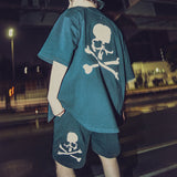 Black Mastermind Japan X New Era Script Logo Shorts featuring bold branding and casual style, perfect for streetwear and summer wear.