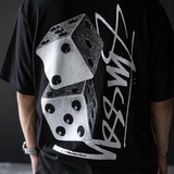 Black Stussy Tall Dice Tee shirt with bold dice graphic print, casual streetwear style, front view, apparel by Stussy.