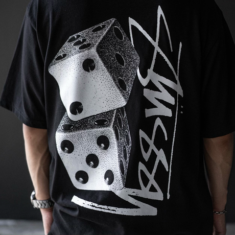Black Stussy Tall Dice Tee shirt featuring a bold dice graphic on the front, casual streetwear style.