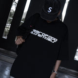 Black Fear of God Essentials Reflective Logo 90s T-shirt featuring a reflective logo print on the front.