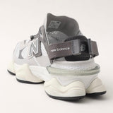 New Balance 9060 Mule Raincloud Castlerock sneakers showing the stylish gray design and textured details.