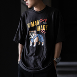 Black Human Made Bulldog Dry Alls Tee featuring a graphic print on the front, casual short-sleeve apparel for everyday wear.