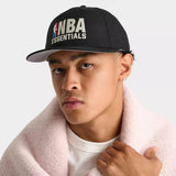 Fear of God Essentials NBA New Era 9FIFTY cap, adjustable headwear with team logo and iconic branding, front view.