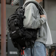 Black Supreme Box Logo backpack with front pocket and adjustable straps, featuring the iconic Supreme logo on the front.