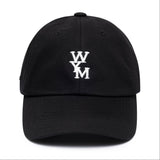 Black Wooyoungmi WYM logo cap, stylish headwear with adjustable strap and embroidered logo, perfect for casual fashion.