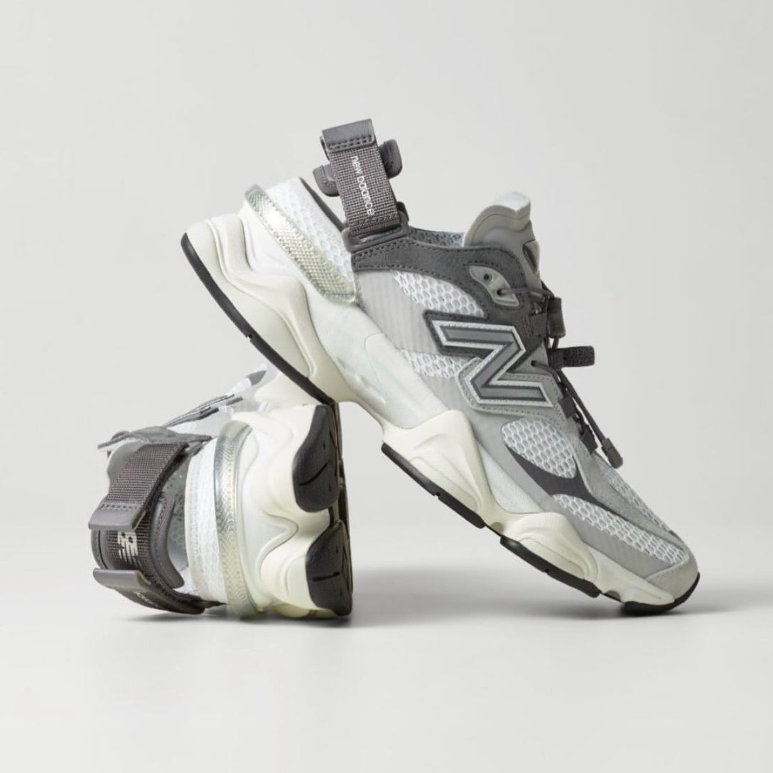 New Balance 9060 Mule Raincloud Castlerock sneakers with grey and blue design, featuring a comfortable slip-on style and textured sole.