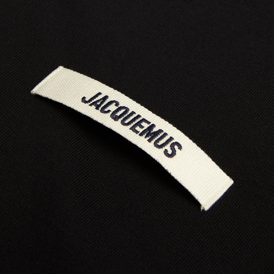 Black Jacquemus Grosgrain Logo Tee from Mastermind Japan, featuring a casual fit with signature logo detailing on the front.