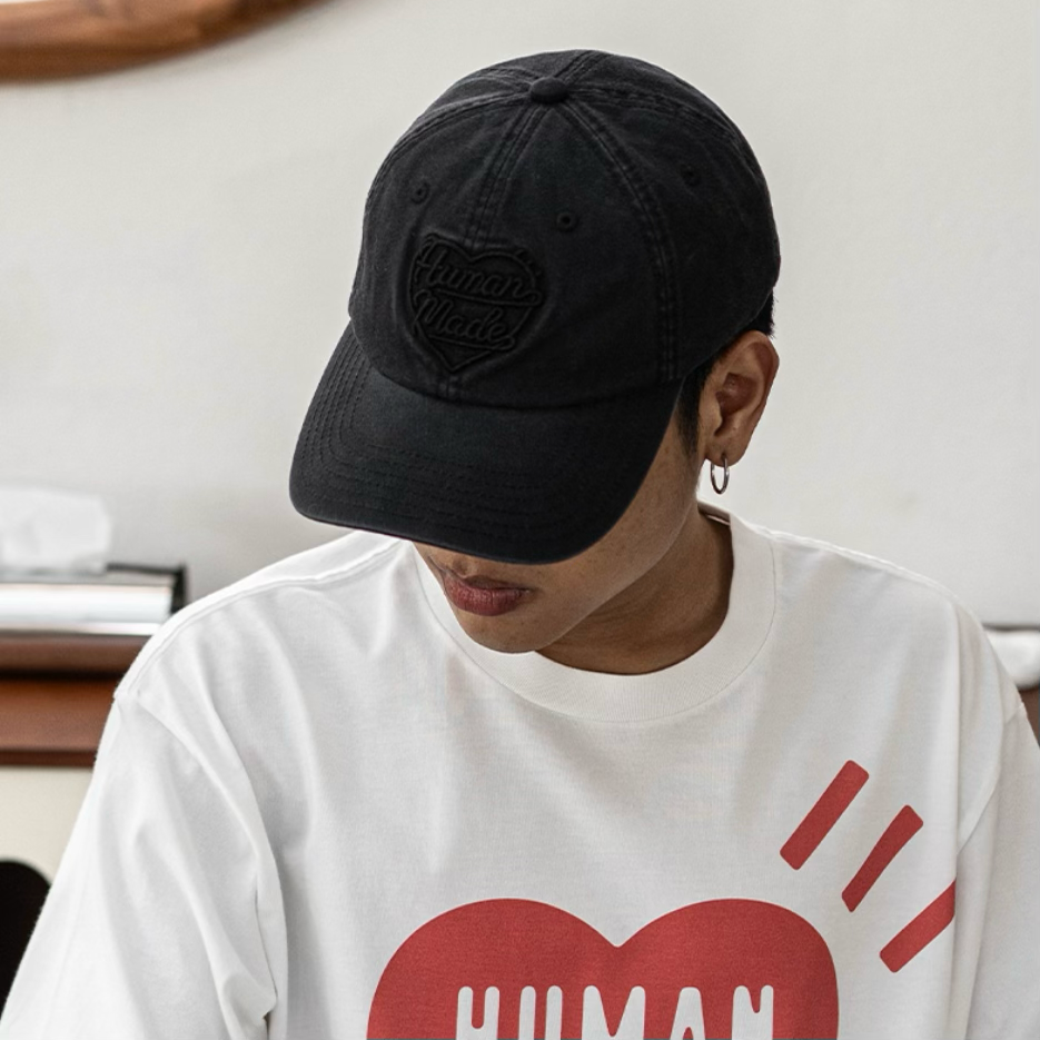 Human Made black 6-panel cap featuring the iconic heart logo, stylish headwear for casual and streetwear looks.