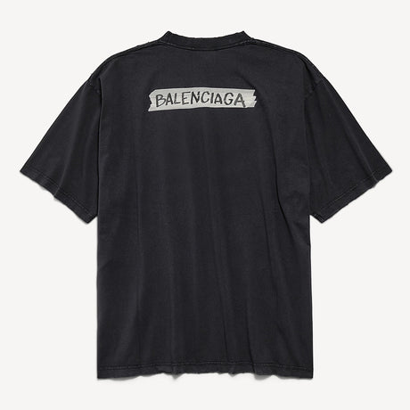 Black Balenciaga Masking Tape Tee shirt featuring the brand logo and casual fit, displayed on a plain background.