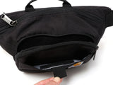 Carhartt black waist bag with adjustable strap and multiple pockets, designed for convenient on-the-go storage.