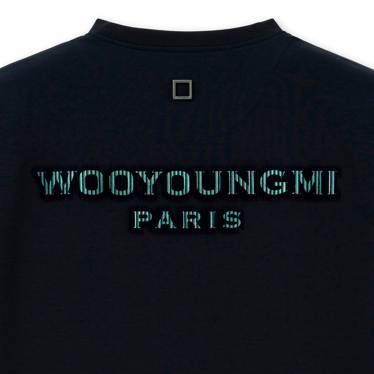 Dark navy Wooyoungmi tuft embroidered back logo tee, casual apparel with subtle embroidered detail and relaxed fit.